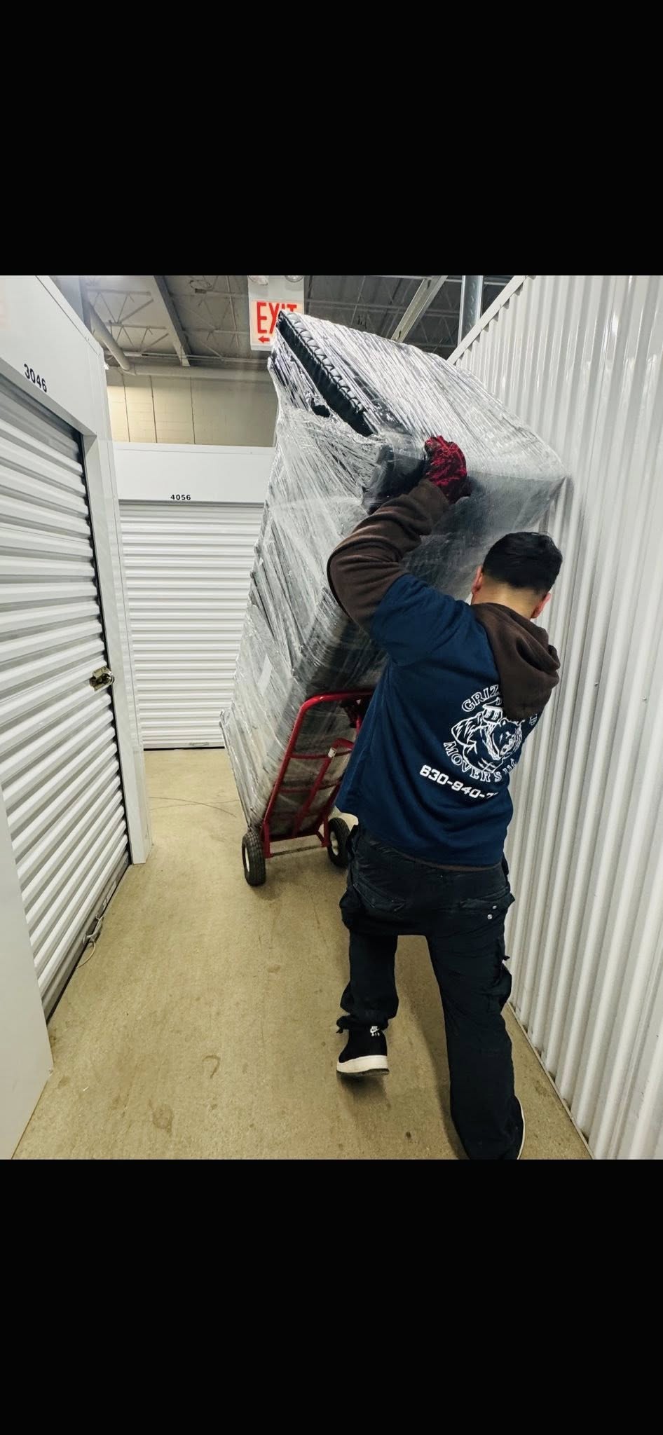 Grizzly Grip mover handling items in storage facility