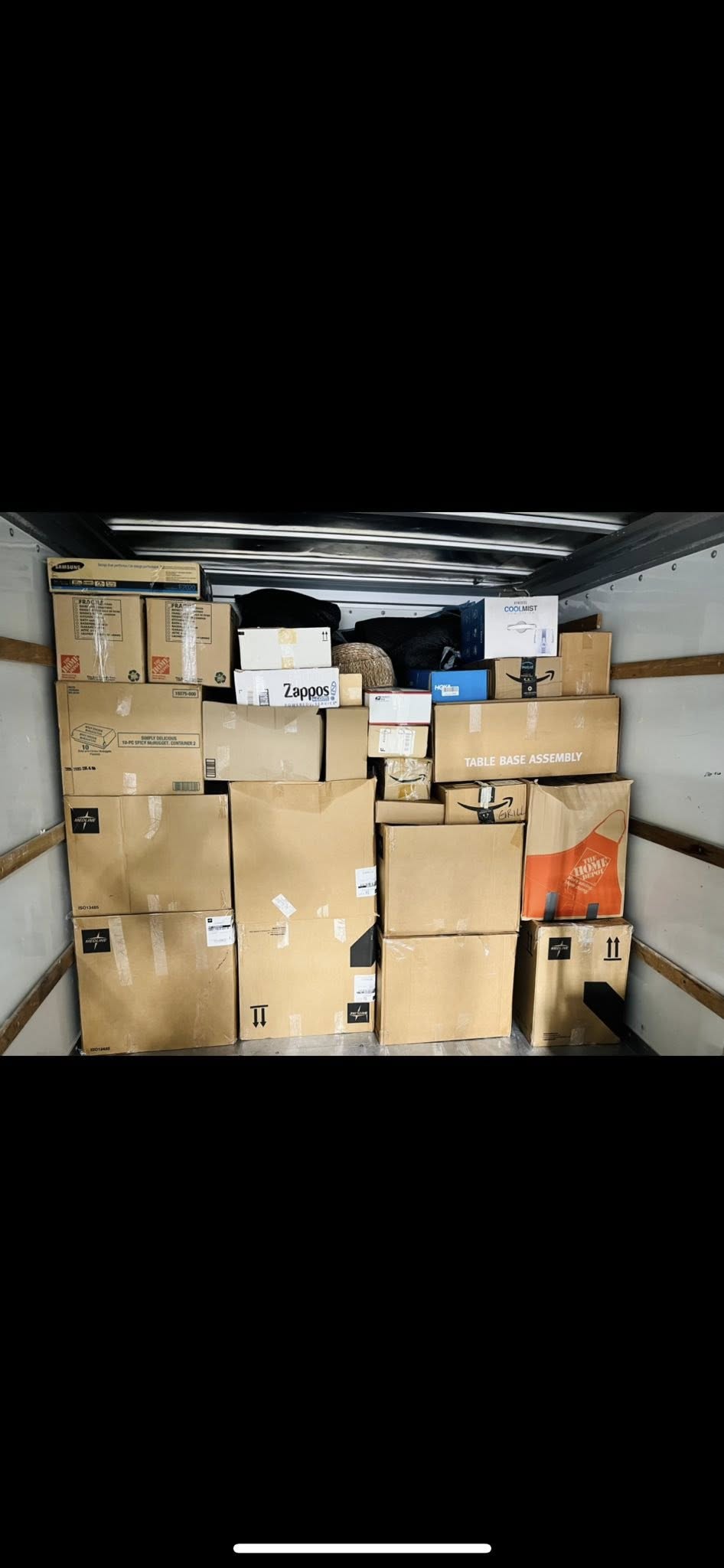 Moving truck fully loaded and organized with boxes